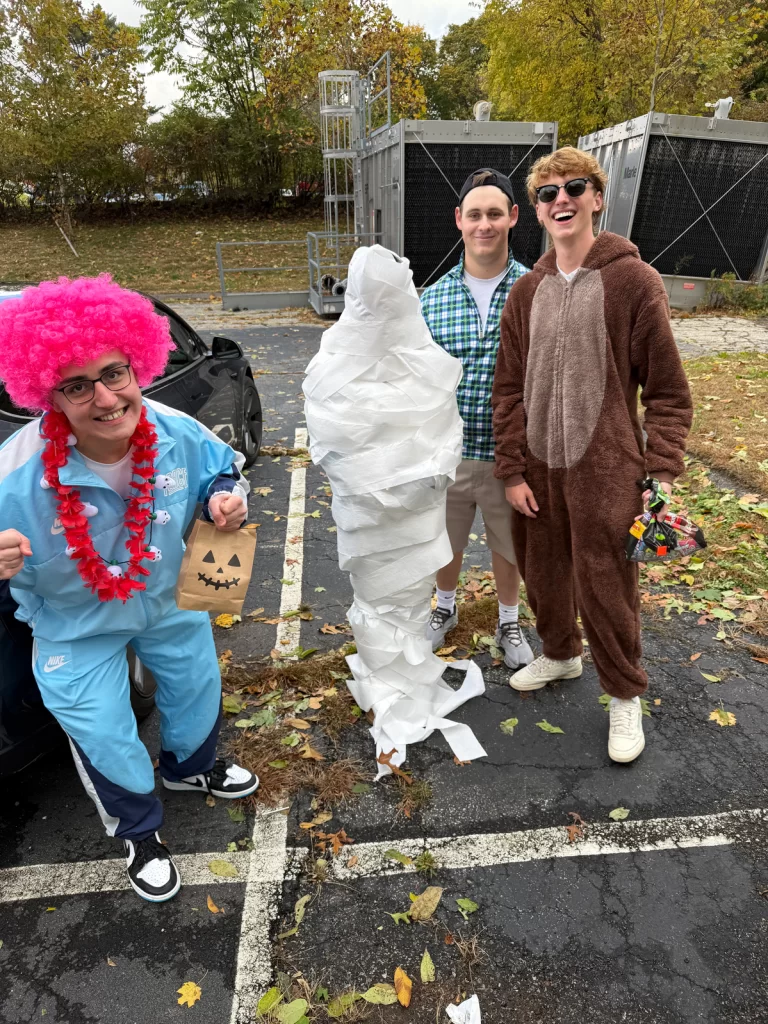 Halloween Truck or Treat four people in their costumes