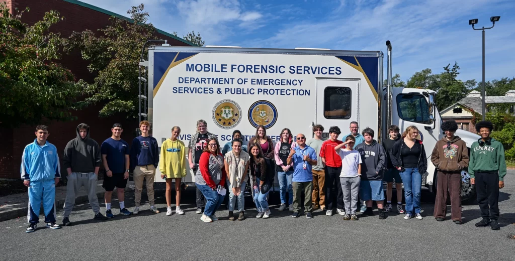 Field trip group at the CT state division of Scientific Services Labs mobile forensic services vehicle