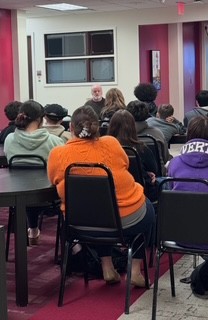 history teacher, Joseph Stradel's Father, a veteran speaking with spire students